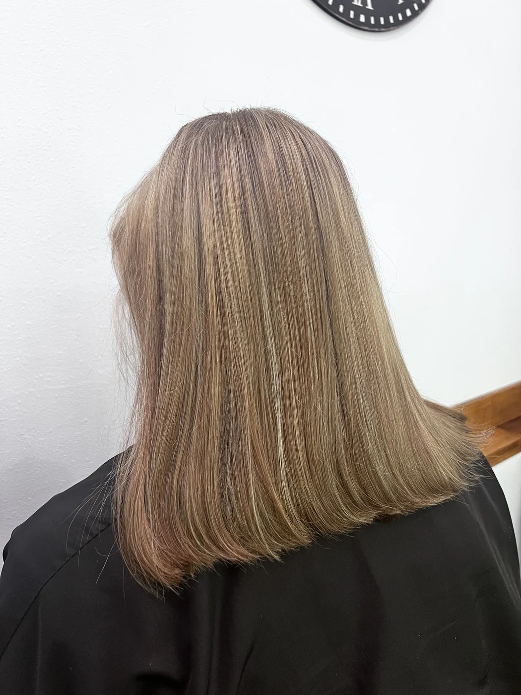 Blonde highlights and balayage on long hair at The Gilded Edge, Seattle hair salon