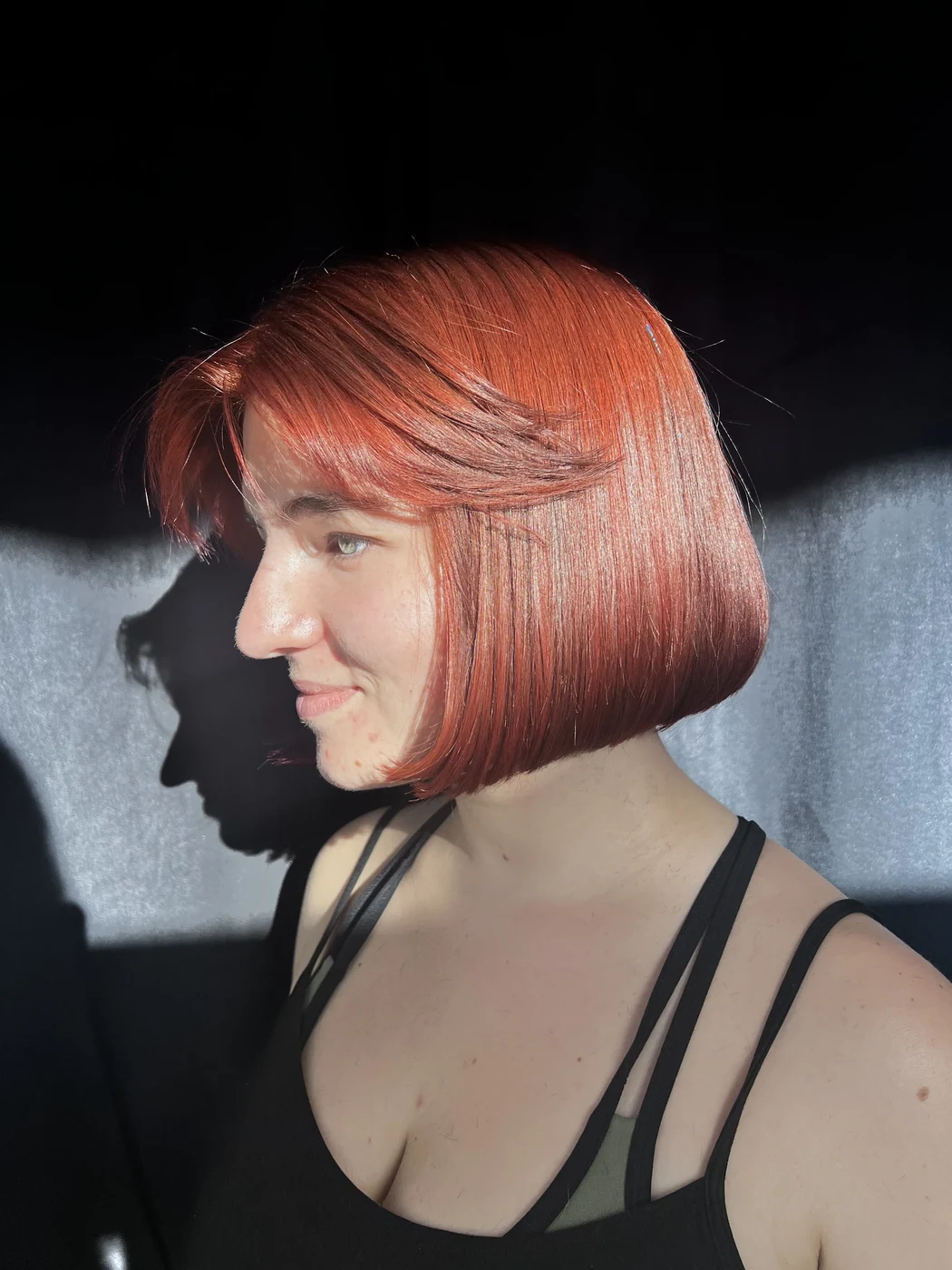 Crisp bob haircut with copper fashion hair color at The Gilded Edge, West Seattle salon
