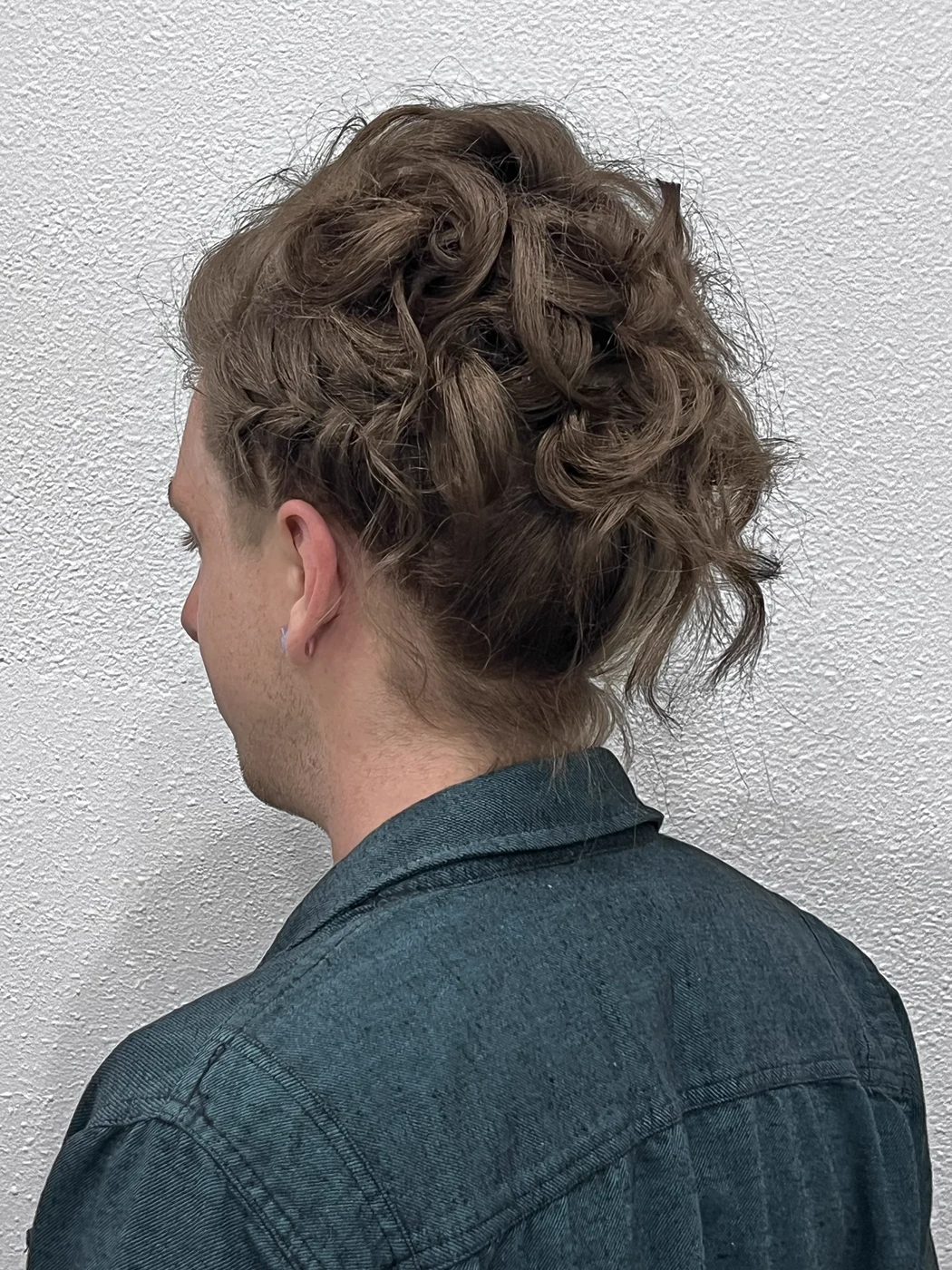 Men's curly natural haircut at The Gilded Edge barbershop, Seattle