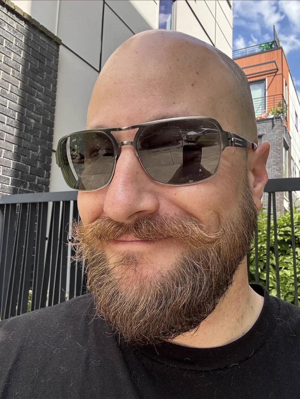 Clean shaved head and shaped beard — barbering at The Gilded Edge, West Seattle